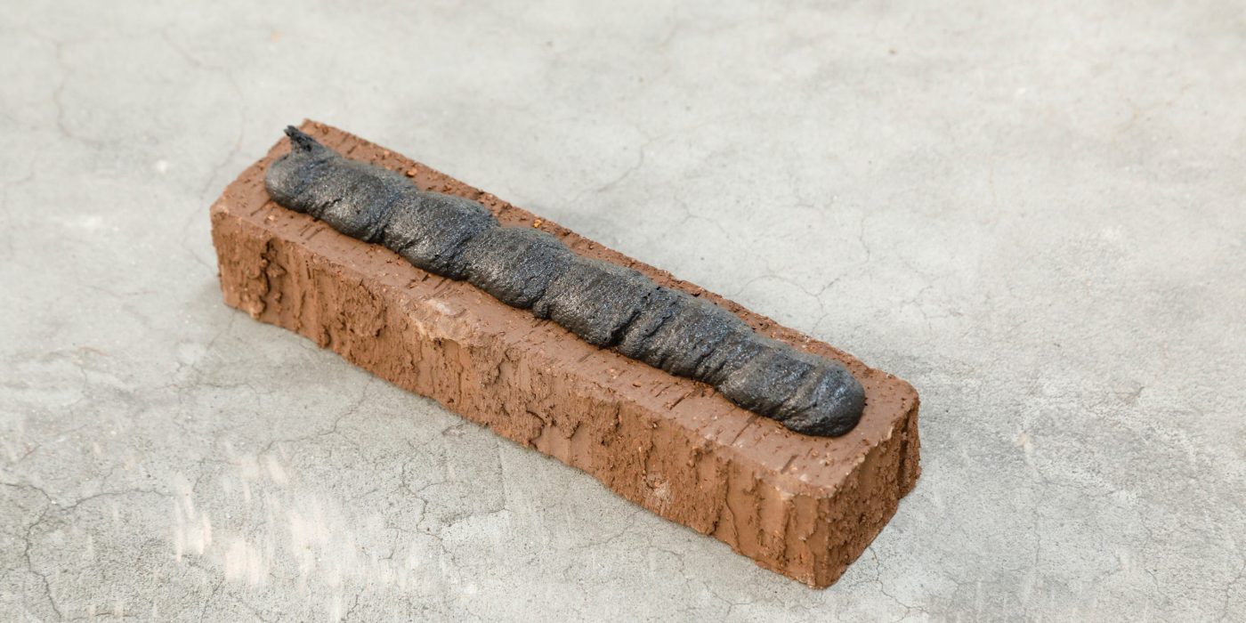 Installing bricks glued facade